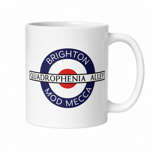 A white ceramic mug featuring a parody of the London Underground Roundel with the text 'BRIGHTON', 'QUADROPHENIA ALLEY', and 'MOD MECCA' in navy blue, white, and red.