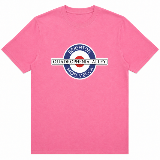 A pink short-sleeve crewneck t-shirt featuring a parody graphic of the London Underground roundel with the text 'BRIGHTON', 'QUADROPHENIA ALLEY', and 'MOD MEECH' in blue, white, and red.