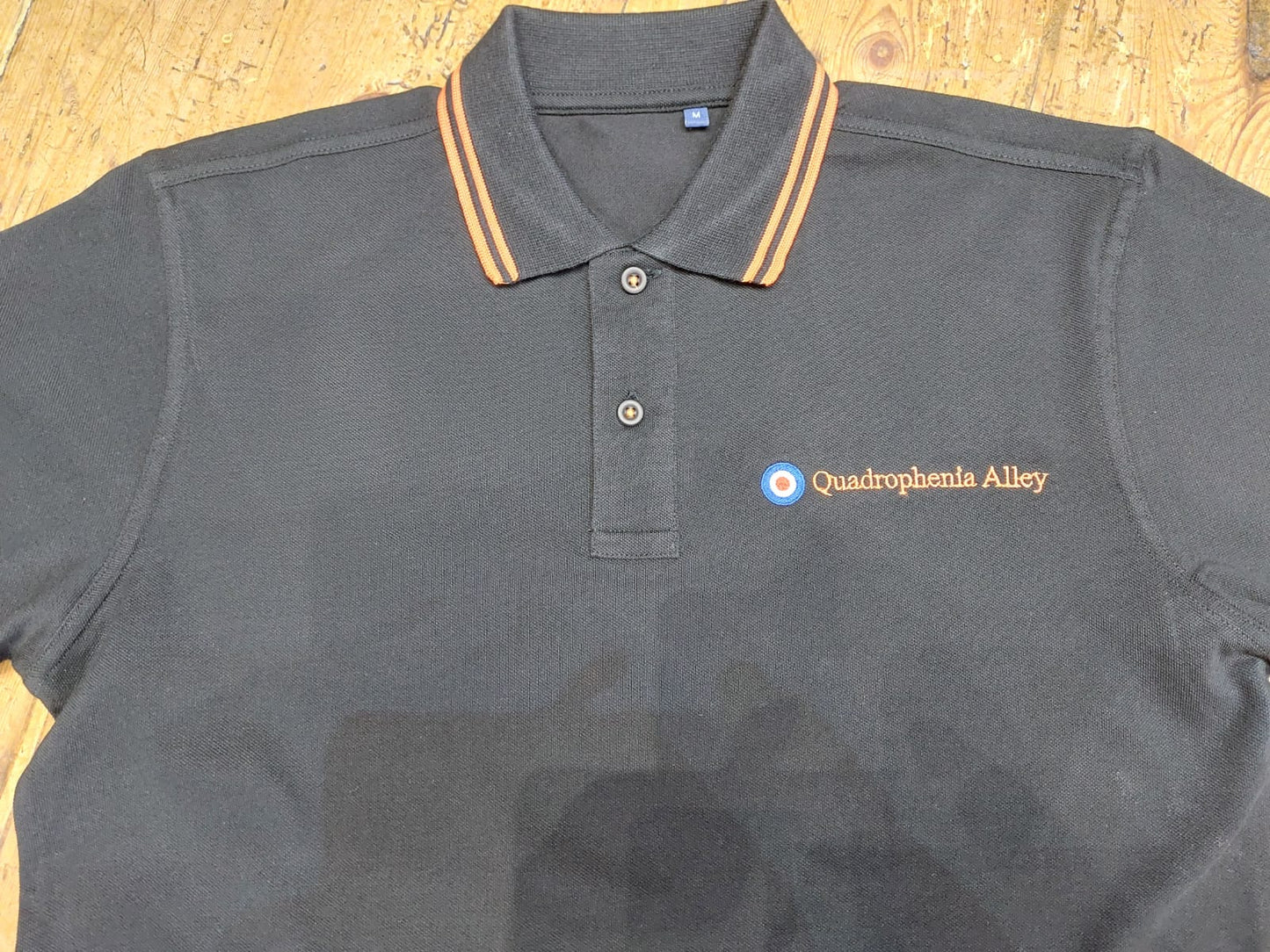 Quadrophenia Alley Men's Exclusive Target Polo Shirt Black/Orange